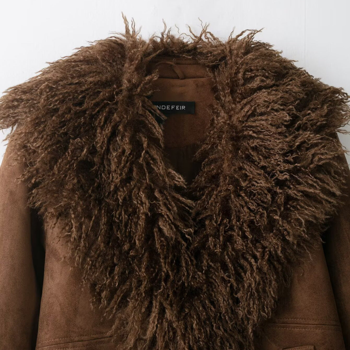 Women's outerwear with faux fur effect jacket